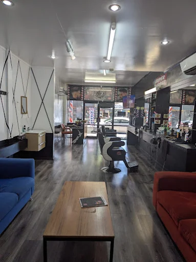 Inside Super Barber barbershop in Hamilton East